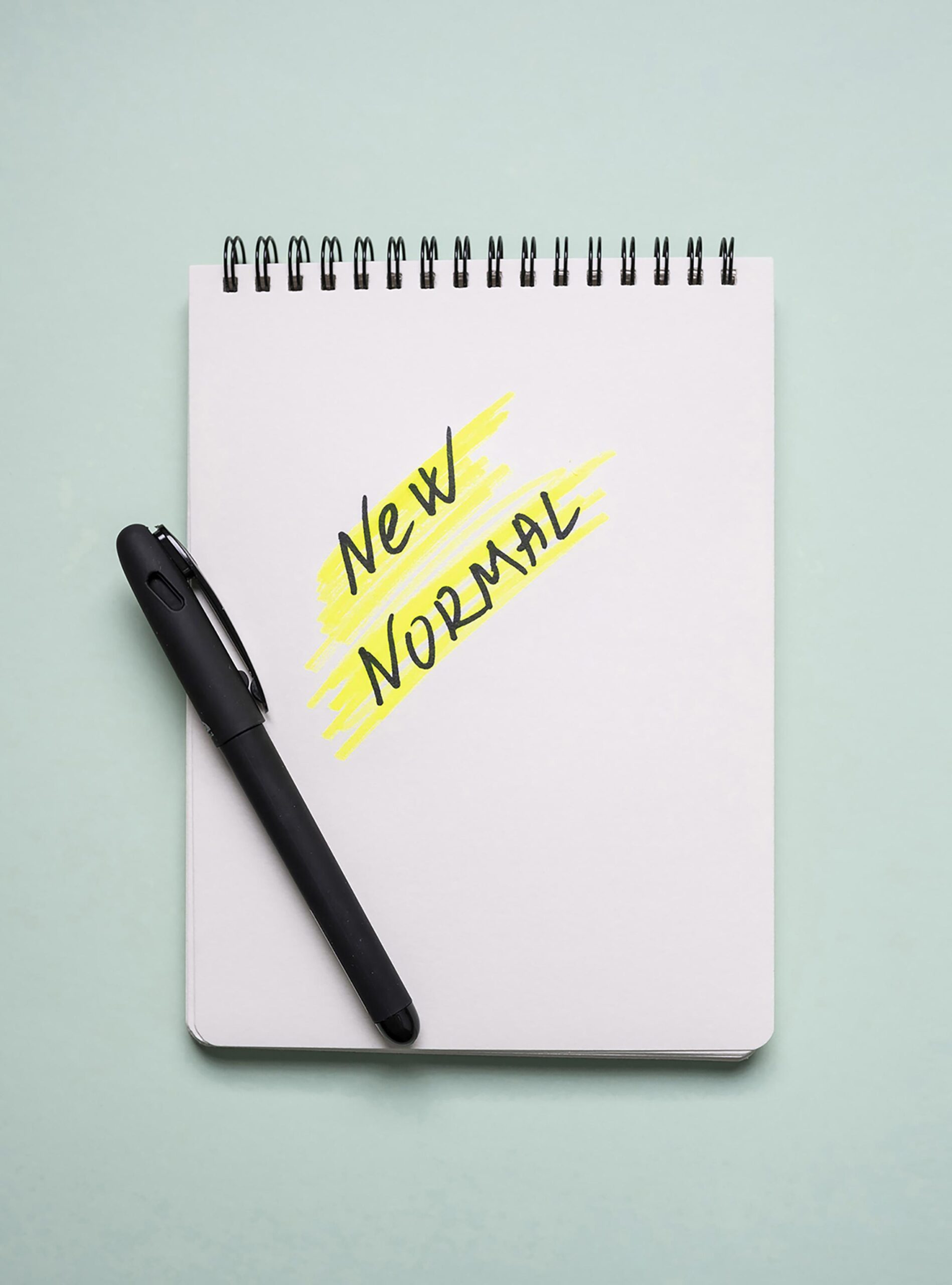 top-view-notebook-with-new-normal-pen